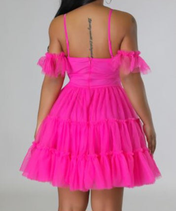 Gorgeous Hot Pink Tulle Dress.You will love this piece. Make a statement ladies!